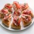 Crostini di prosciutto e burrata