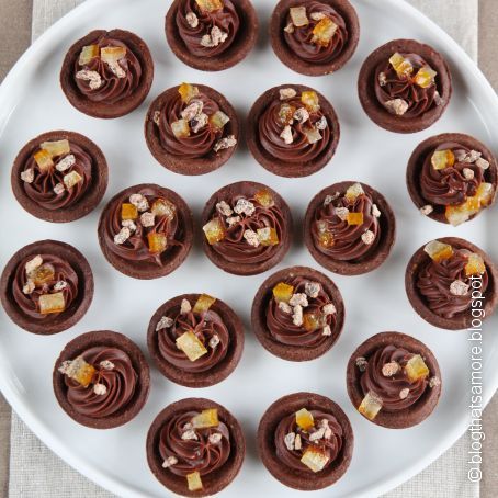 Crostatine con crema al cioccolato e arance candite