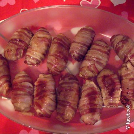Piccoli polpettoni ripieni e avvolti con il bacon