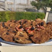 Melanzane a cotoletta con pomodori secchi e olive