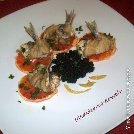 Antipasto di alici, arance e uova di lompo
