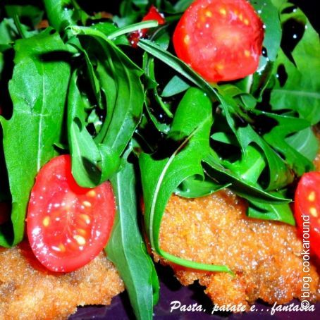Cotoletta di funghi con rucola, datterini e glassa all'aceto balsamico