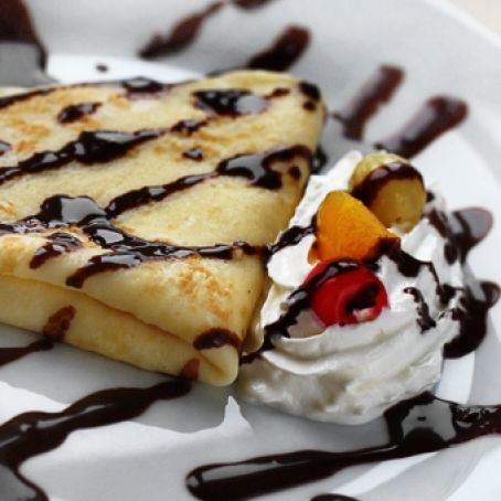 Crepes dolci al rum e arancia
