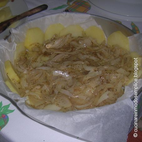 Tortino
di patate con mortadella e filante al forno