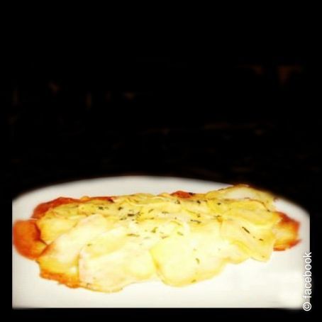 Pesce al forno in crosta di patate