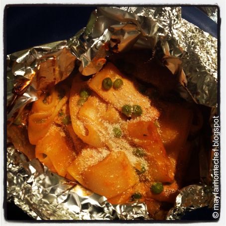 Paccheri al cartoccio con ragù vegano di miglio pisellini e paprika