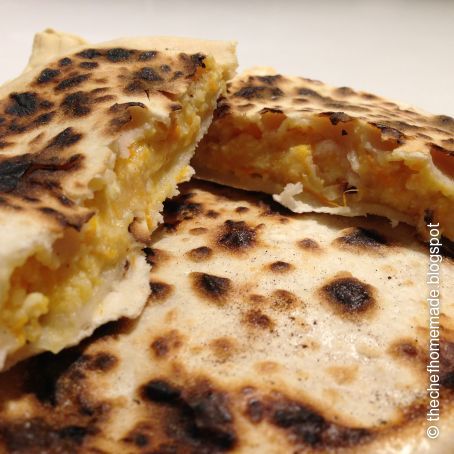 Tortelli alla lastra zucca, patate e ricotta