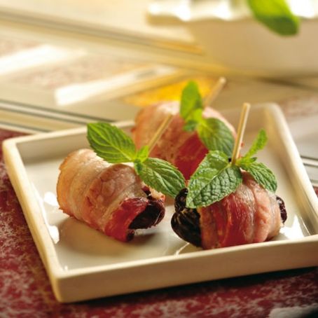 Prugne e bacon al forno