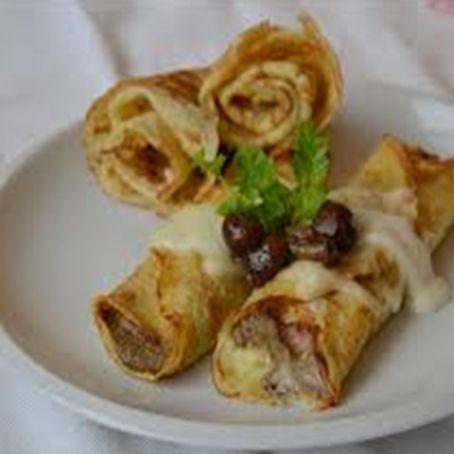 Crepes con prosciutto e funghi