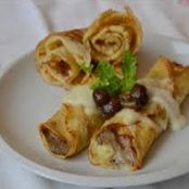 Crepes con prosciutto e funghi