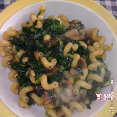 Pasta con funghi e spinaci