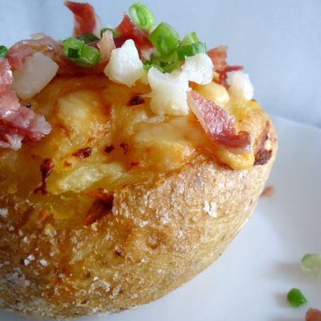 Patate
con formaggio e pancetta