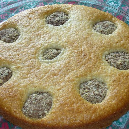 Torta
al cocco con palline affogate